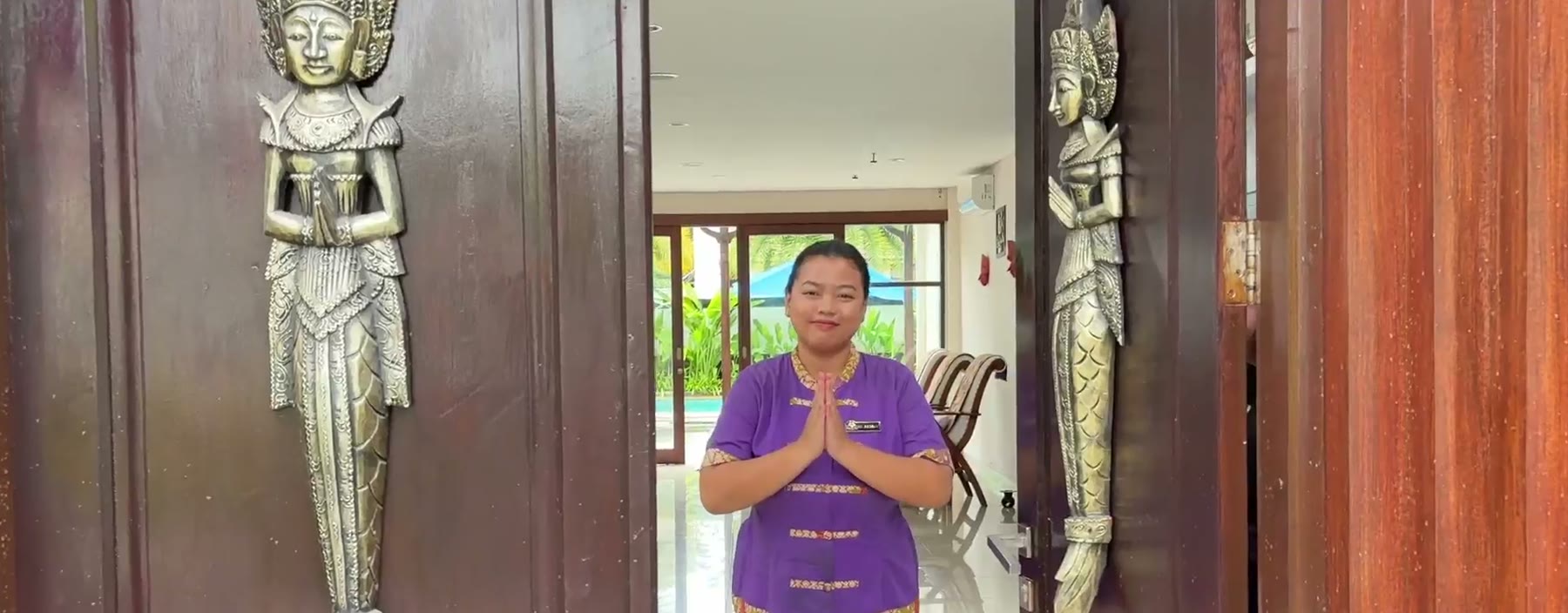 Carved entrance doors to Tirta Ayu Spa